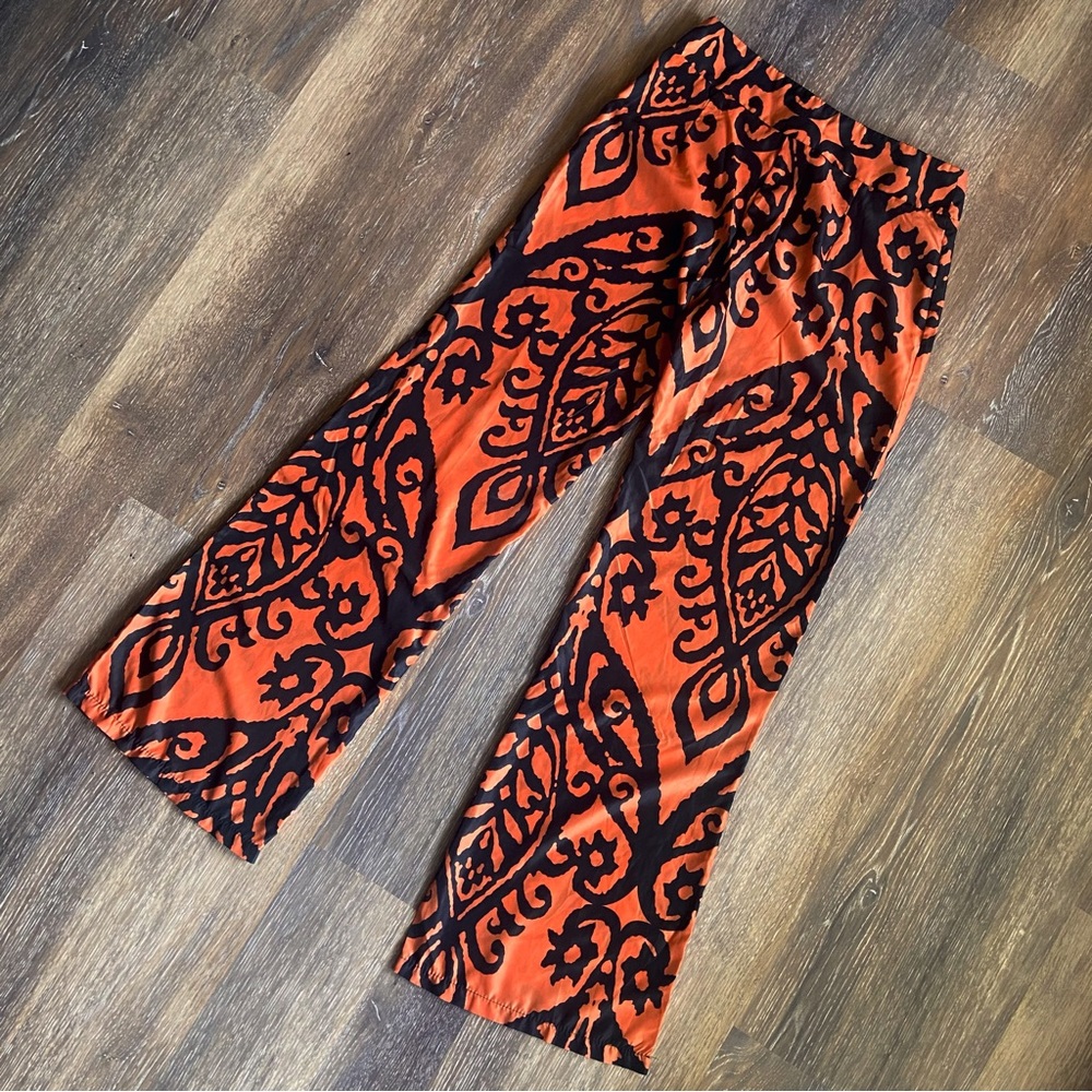 One of a kind black and orange printed wide leg pants with side zipper